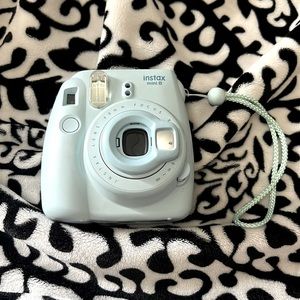 Gently used Fujifilm Instax Mini 8 Polaroid Camera